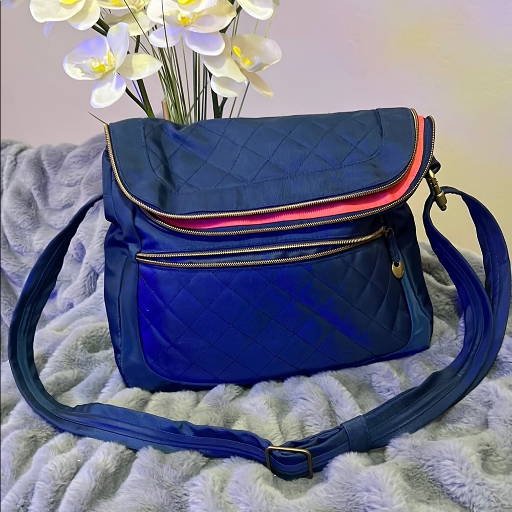 Travelon Blue Crossbody Bag with Pink Accent